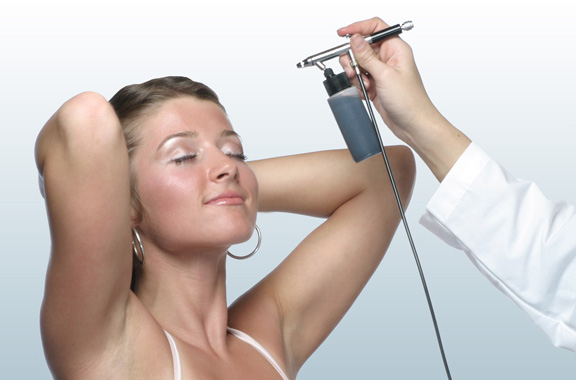 what is spray tanning